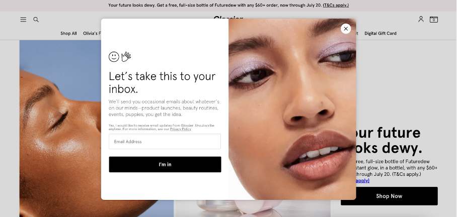 Glossier weboldal popup példa